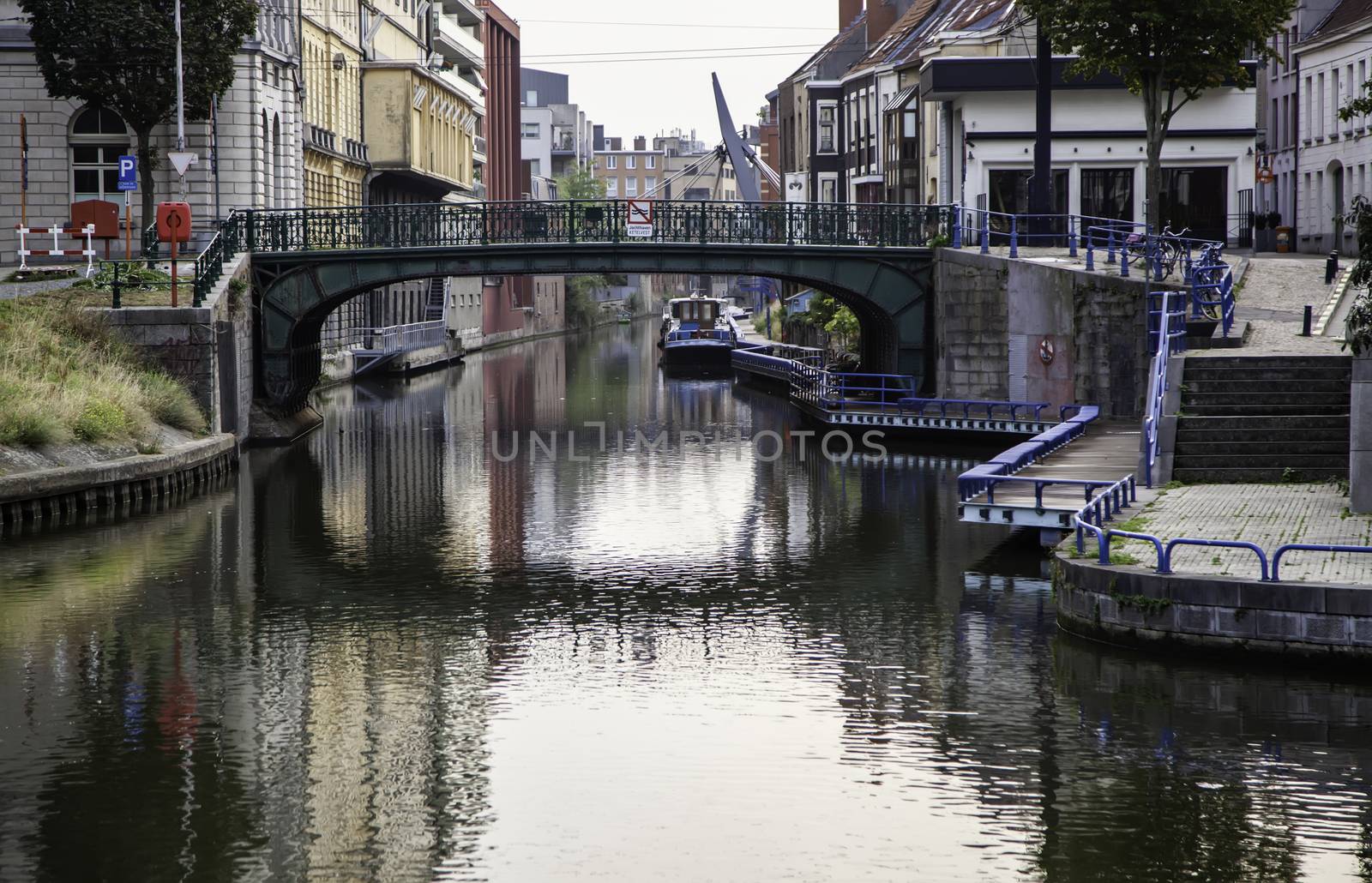 Old canal of the city of Ghent, detail of tourism, Europe