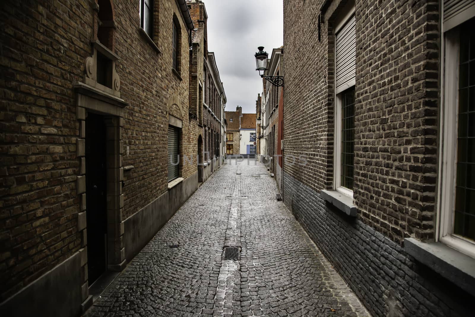 Typical Bruges alley, street detail of Belgium, tourism in Europe