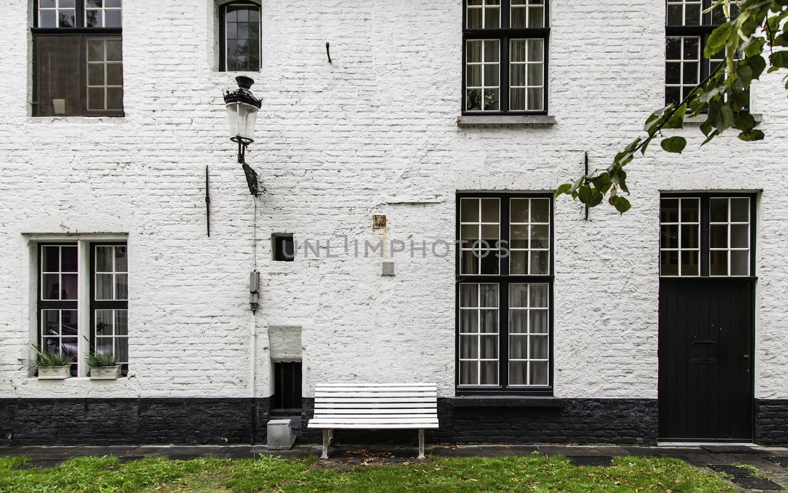 Begijnhof, typical and old district of Bruges, detail of typical Belgian house, tourism in Europe