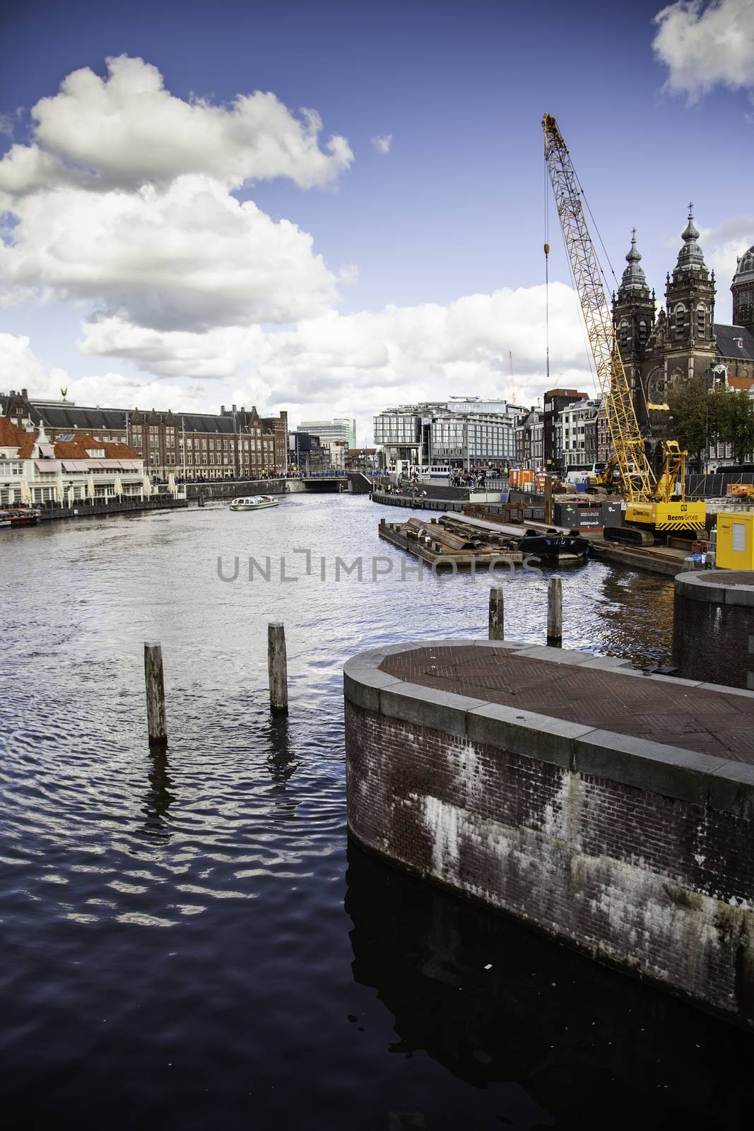 AMSTERDAM, NETHERLAND - SEPTEMBER 06, 2018, Central station building. The building of the Central station is one of the architectural attractions of the city, Netherland on September 06, 2018