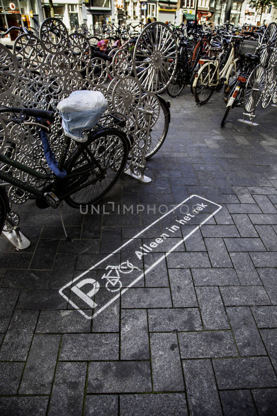 Bicycle parking in Amsterdam, transport detail for people, sport and health