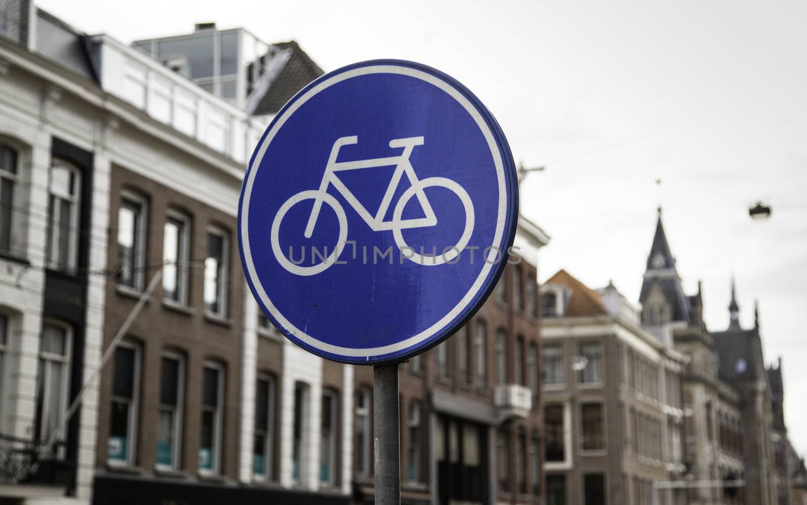 Bicycle sign with arrow, detail of information, transport