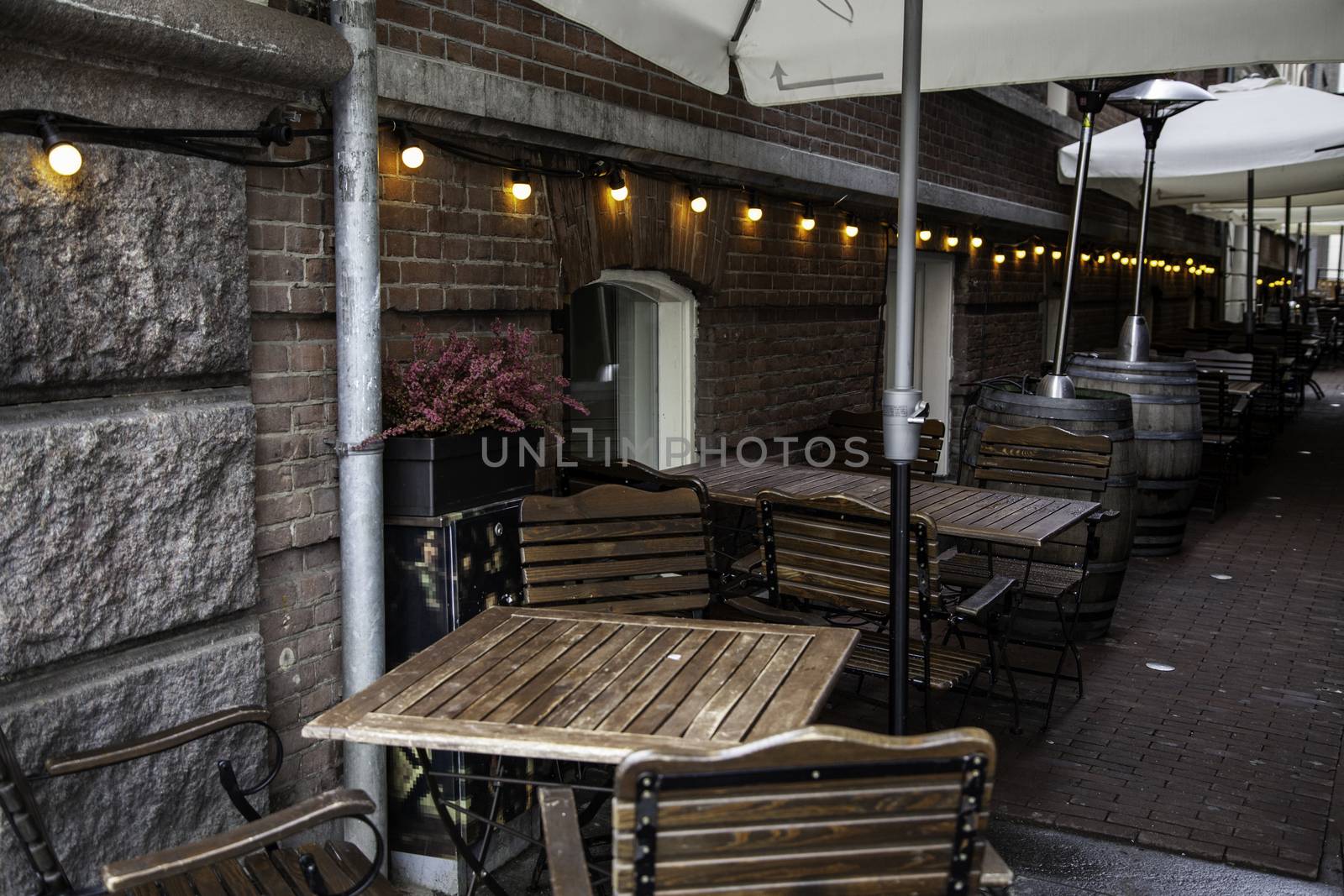 Terrace in amsterdam, detail of tables and chairs in the city