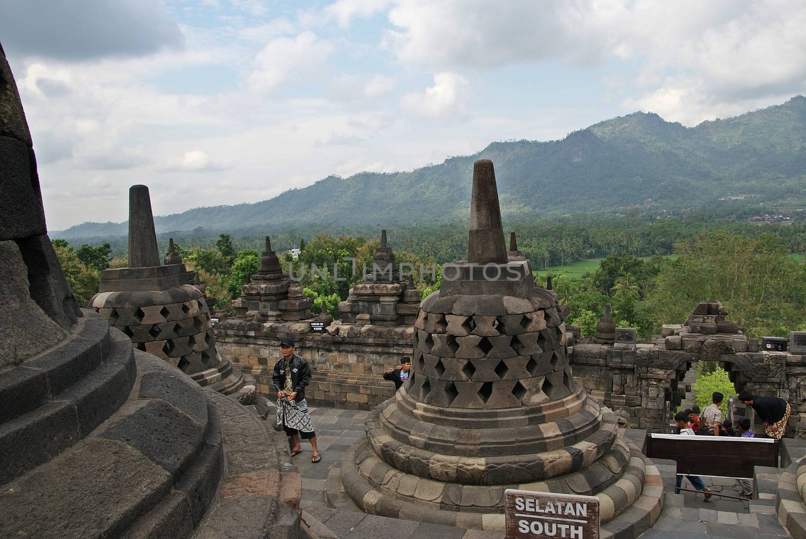 Around the circular platforms are 72 openwork stupas, each containing a statue of the Buddha. by craigansibin