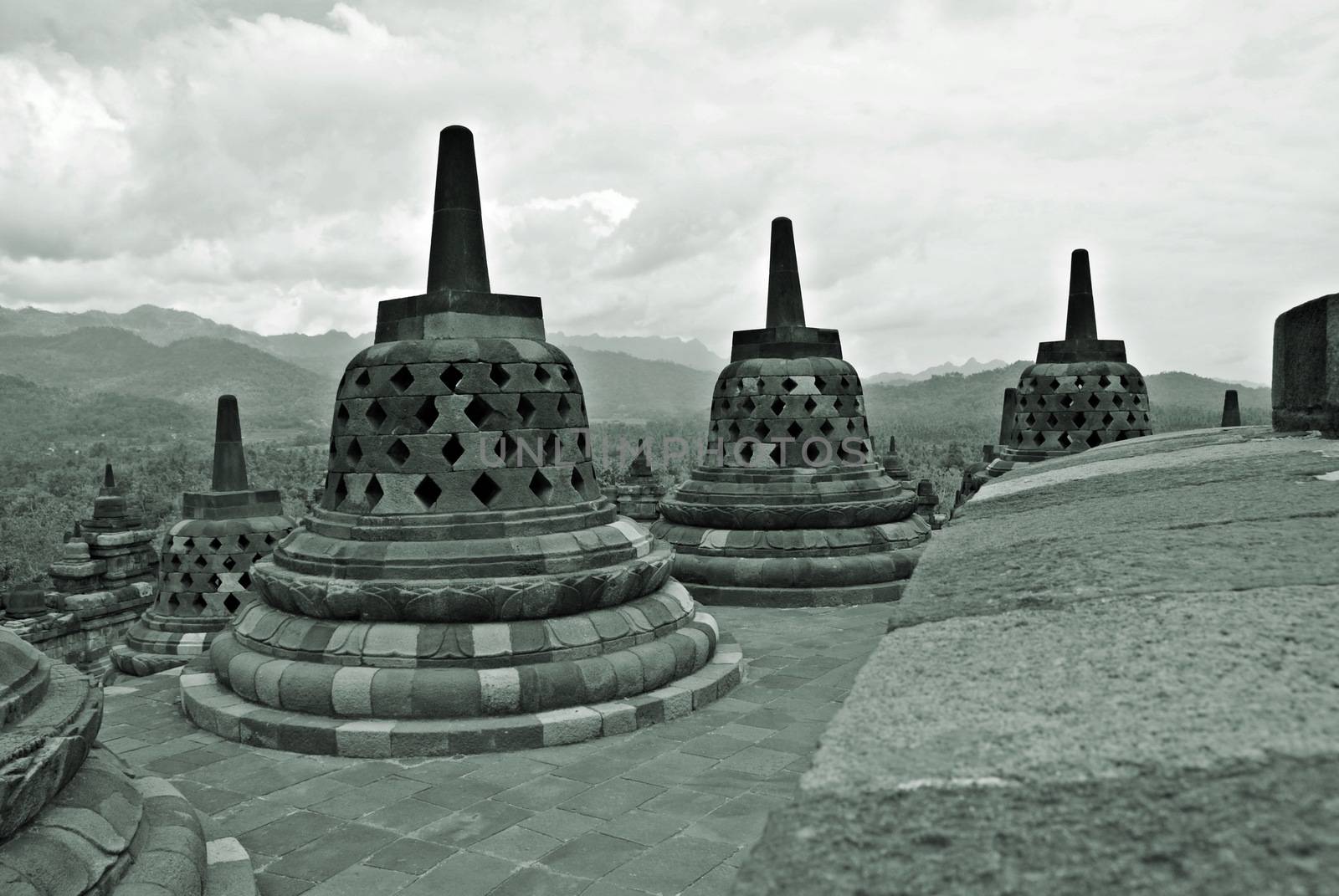 Around the circular platforms are 72 openwork stupas, each containing a statue of the Buddha. by craigansibin