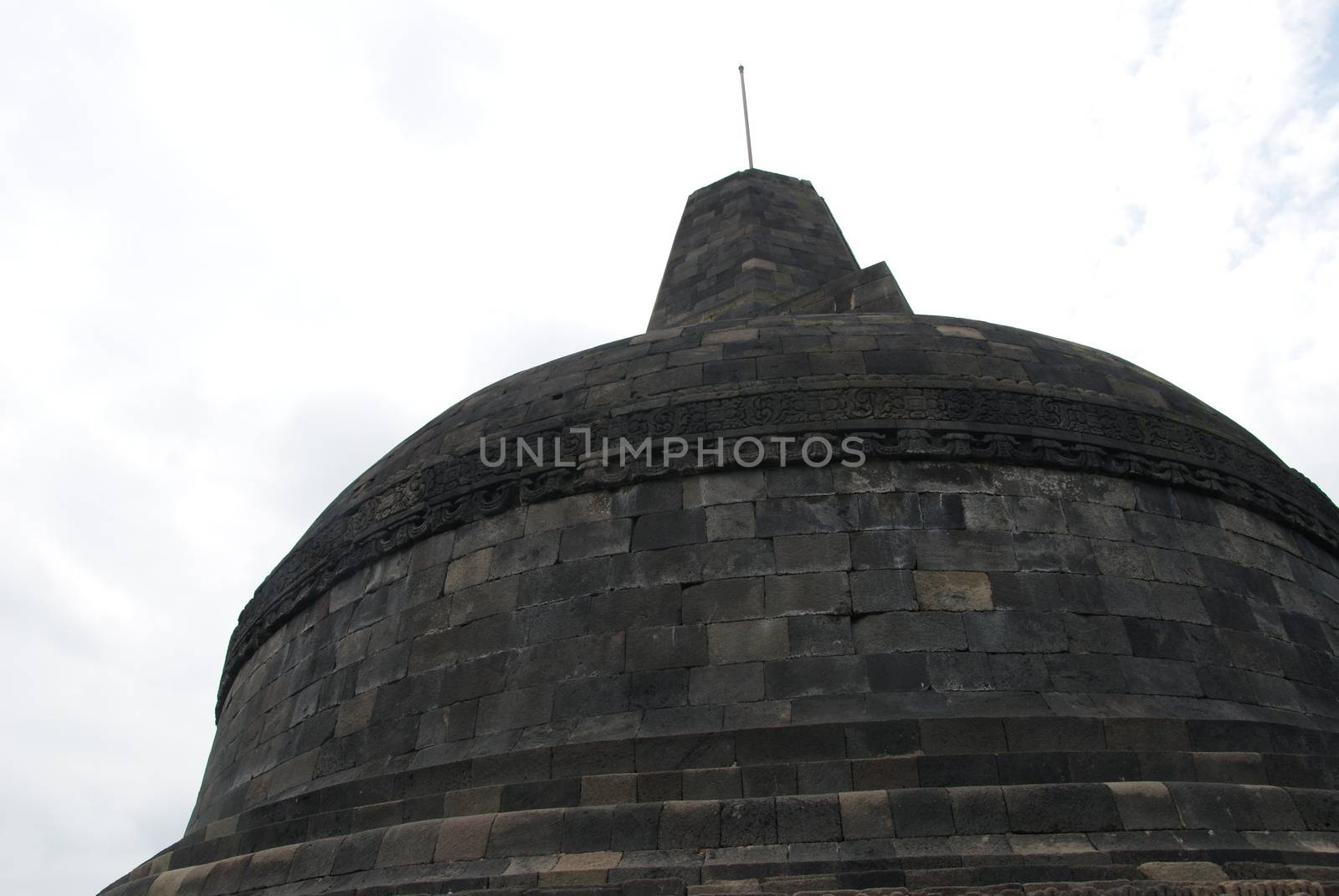 Around the circular platforms are 72 openwork stupas, each containing a statue of the Buddha. by craigansibin