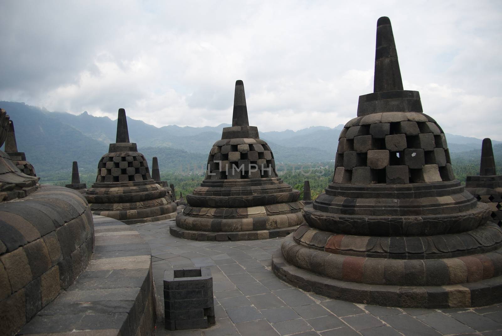 Around the circular platforms are 72 openwork stupas, each containing a statue of the Buddha.