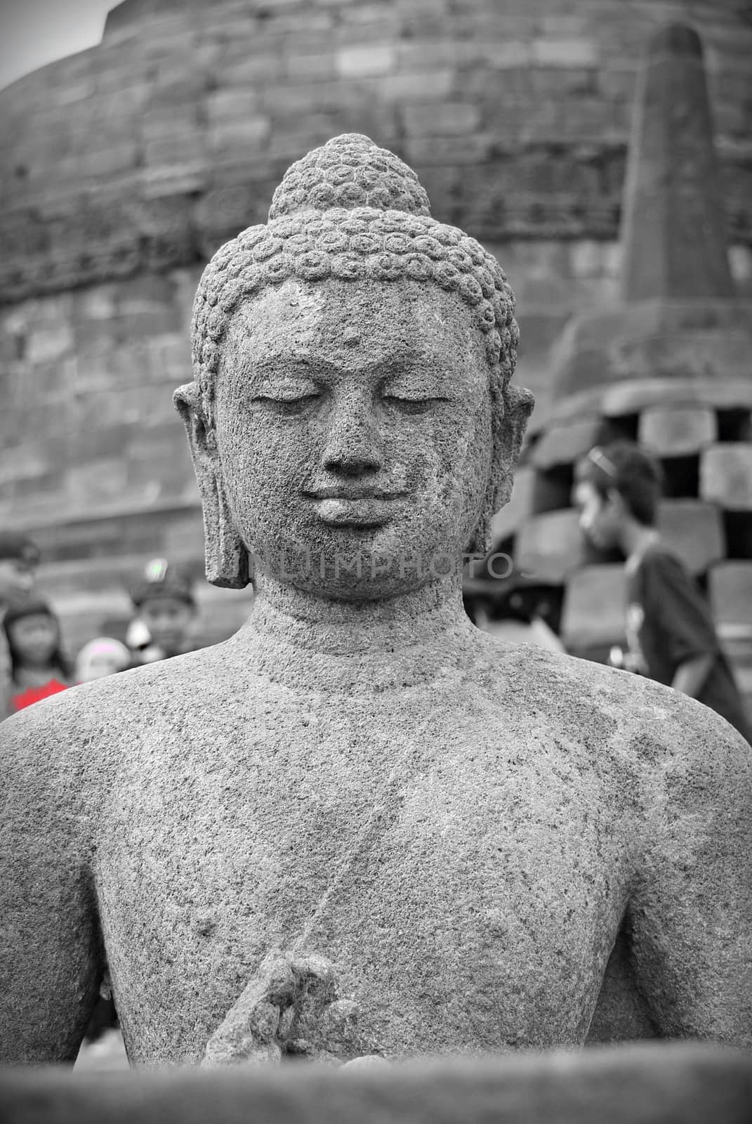 Image of sitting Buddha in Borobudur Temple, Jogjakarta, Indonesia by craigansibin