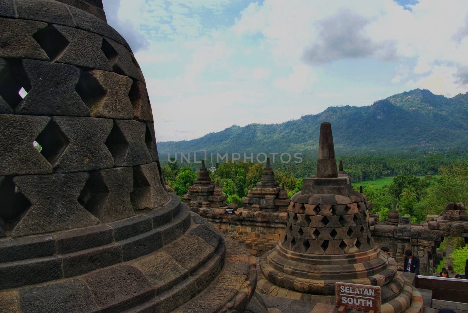 Around the circular platforms are 72 openwork stupas, each containing a statue of the Buddha. by craigansibin