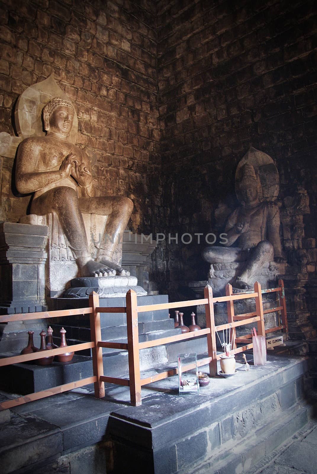 Inside the historical complex of Mendut Temple in Indonesia by craigansibin