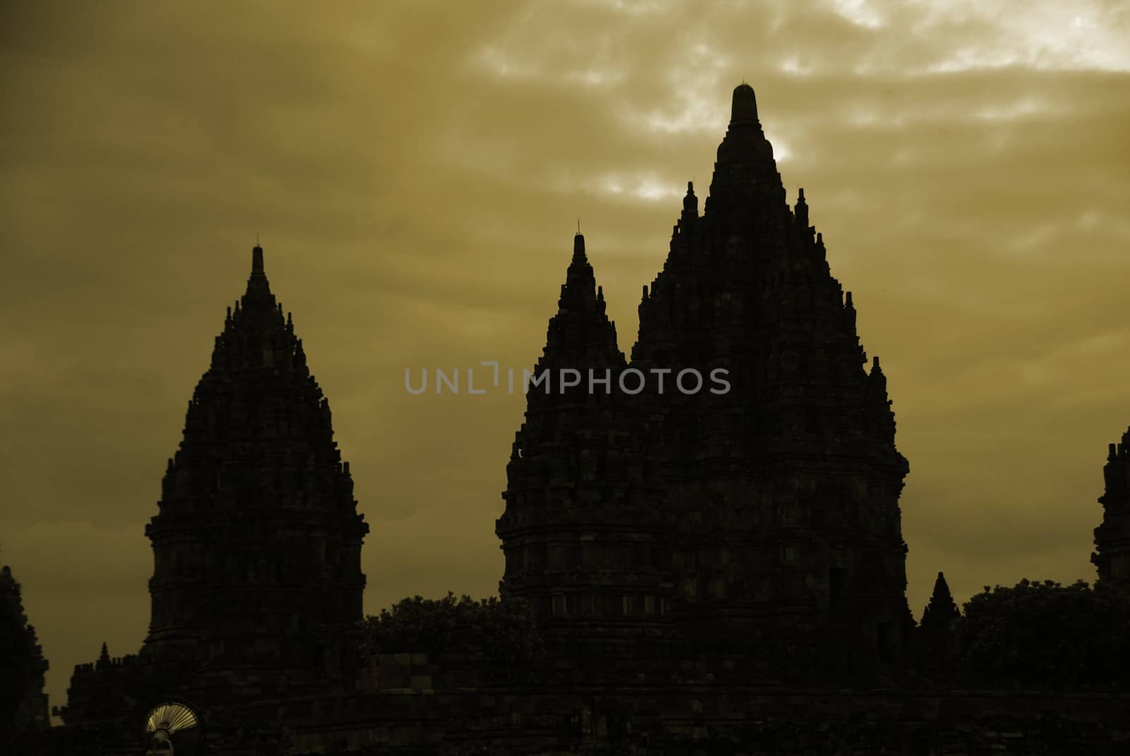 Beautiful silhouette of Prambanan Historical Complex by craigansibin