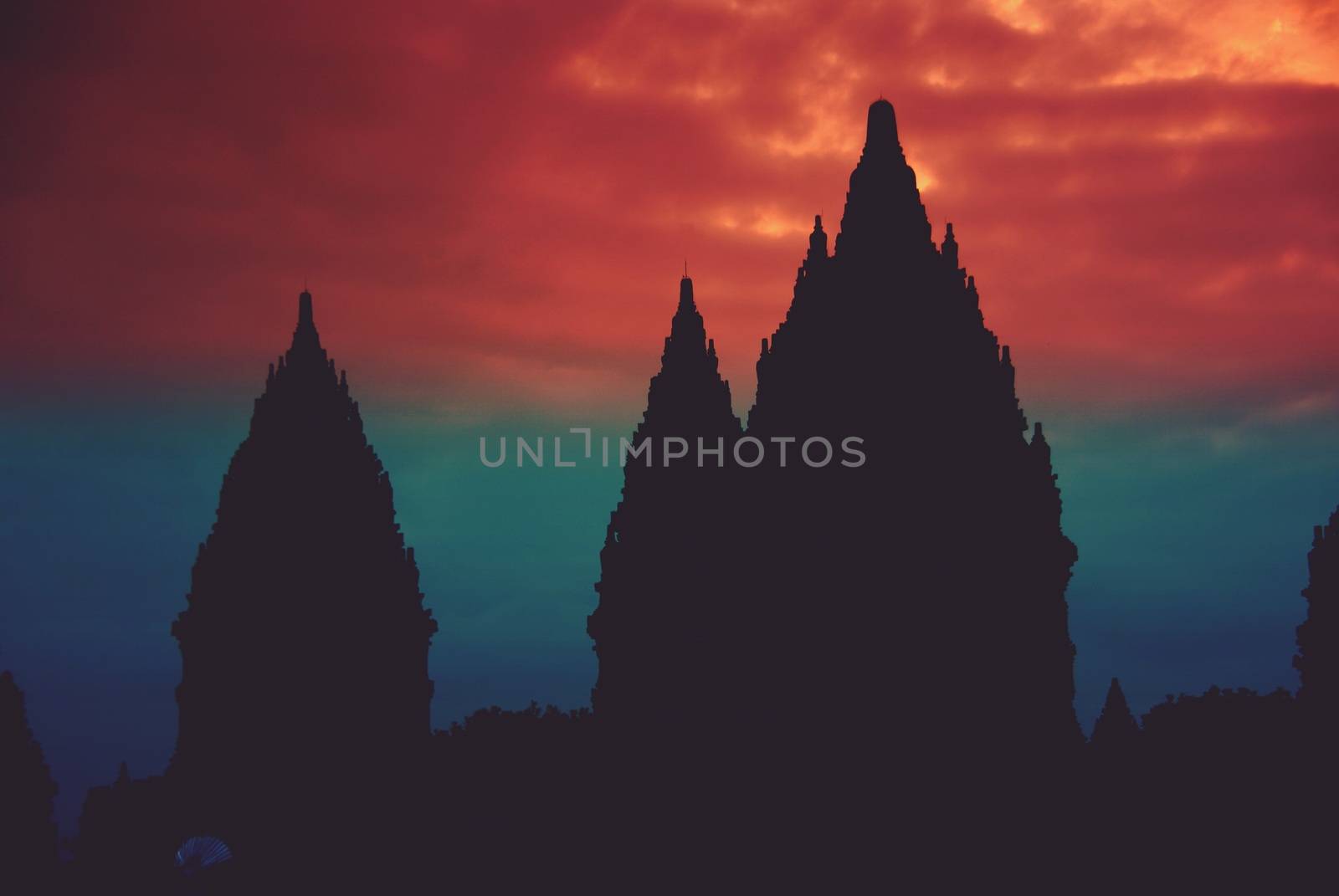 Beautiful silhouette of Prambanan Historical Complex by craigansibin