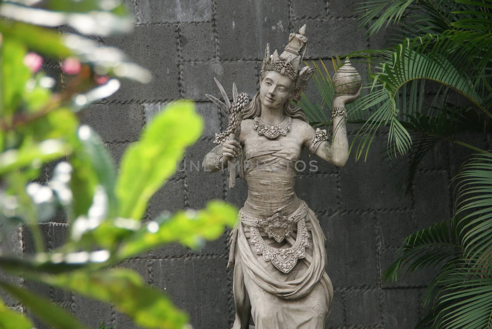 beautiful marble of women statue in traditional indonesian attire