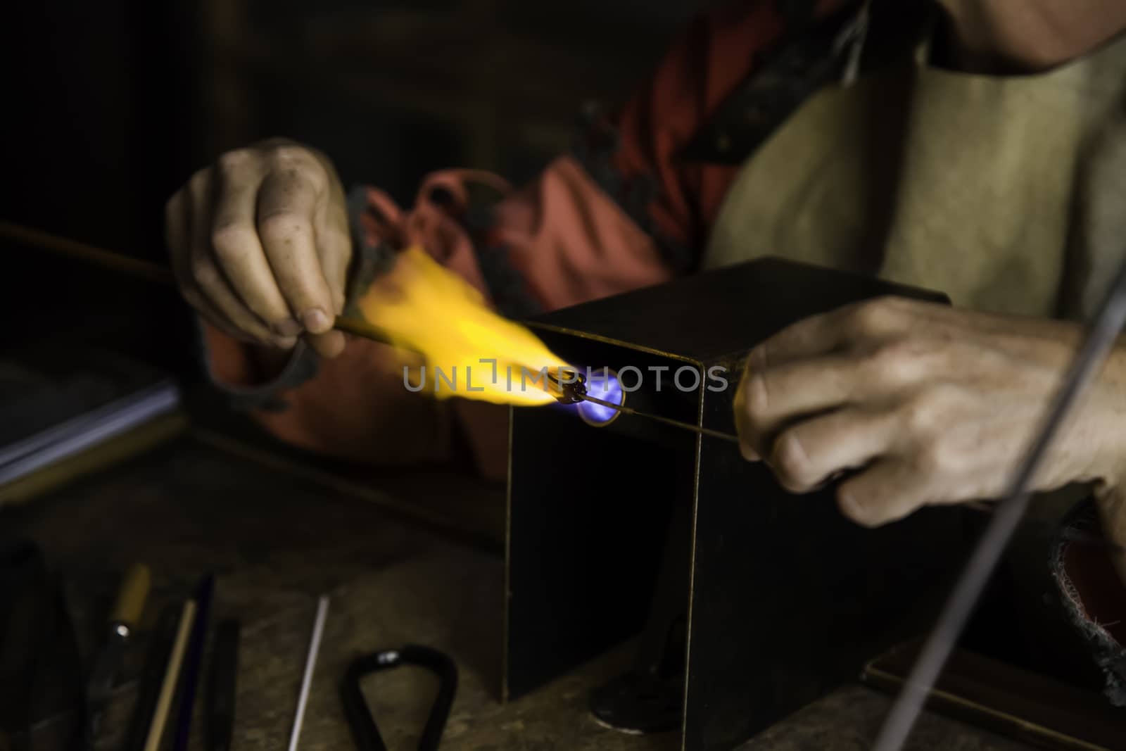 Blowing glass in a traditional way, art detail