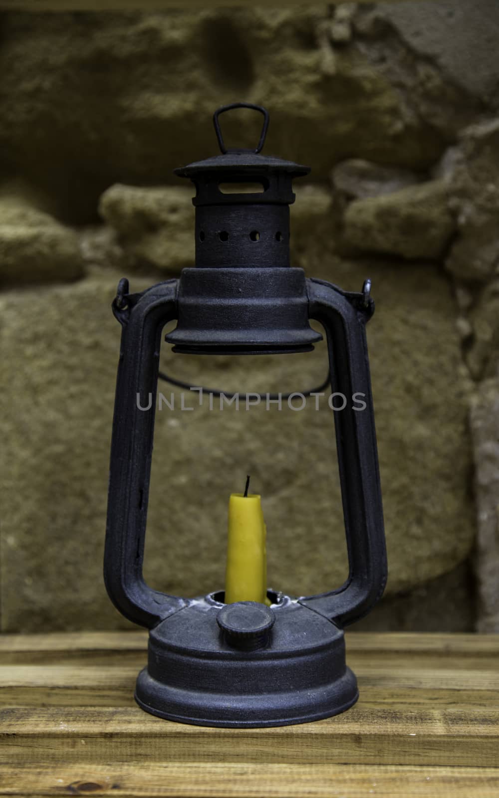 Old candle with wax candle, lighting detail