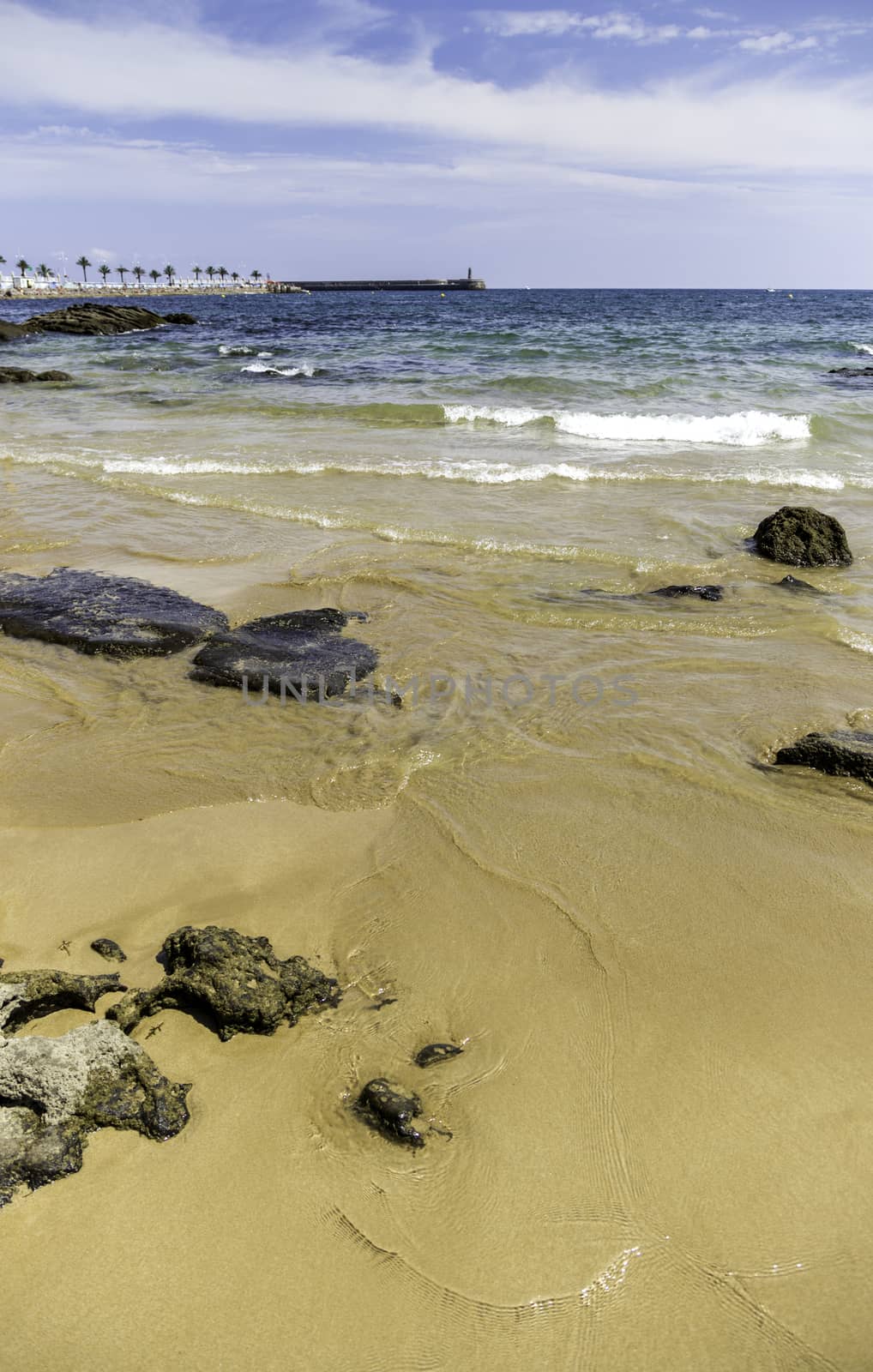 Sandy beach with stones, detail Sea and summer holiday
