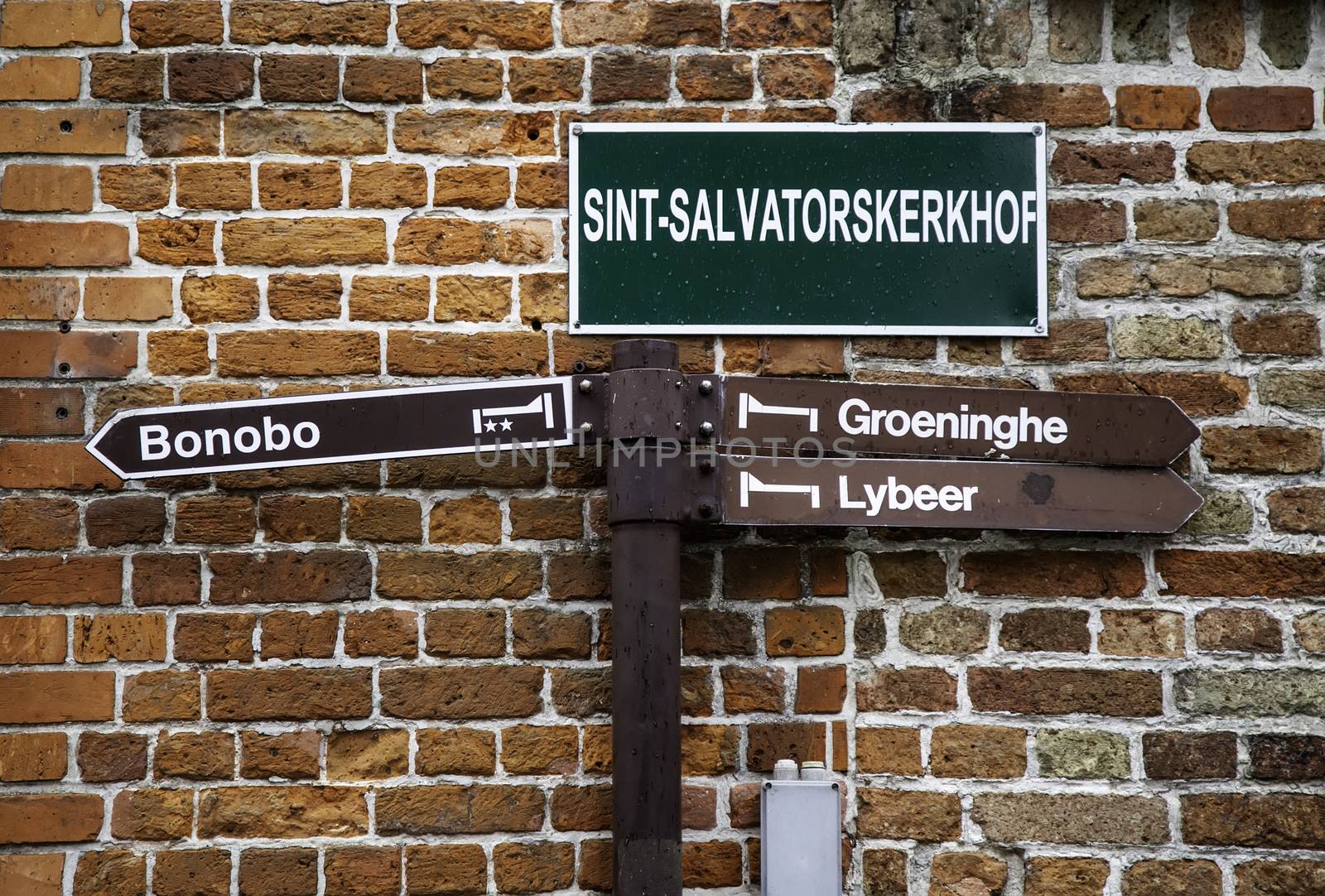 Signs in the city of Bruges, detail of tourist information in Belgium
