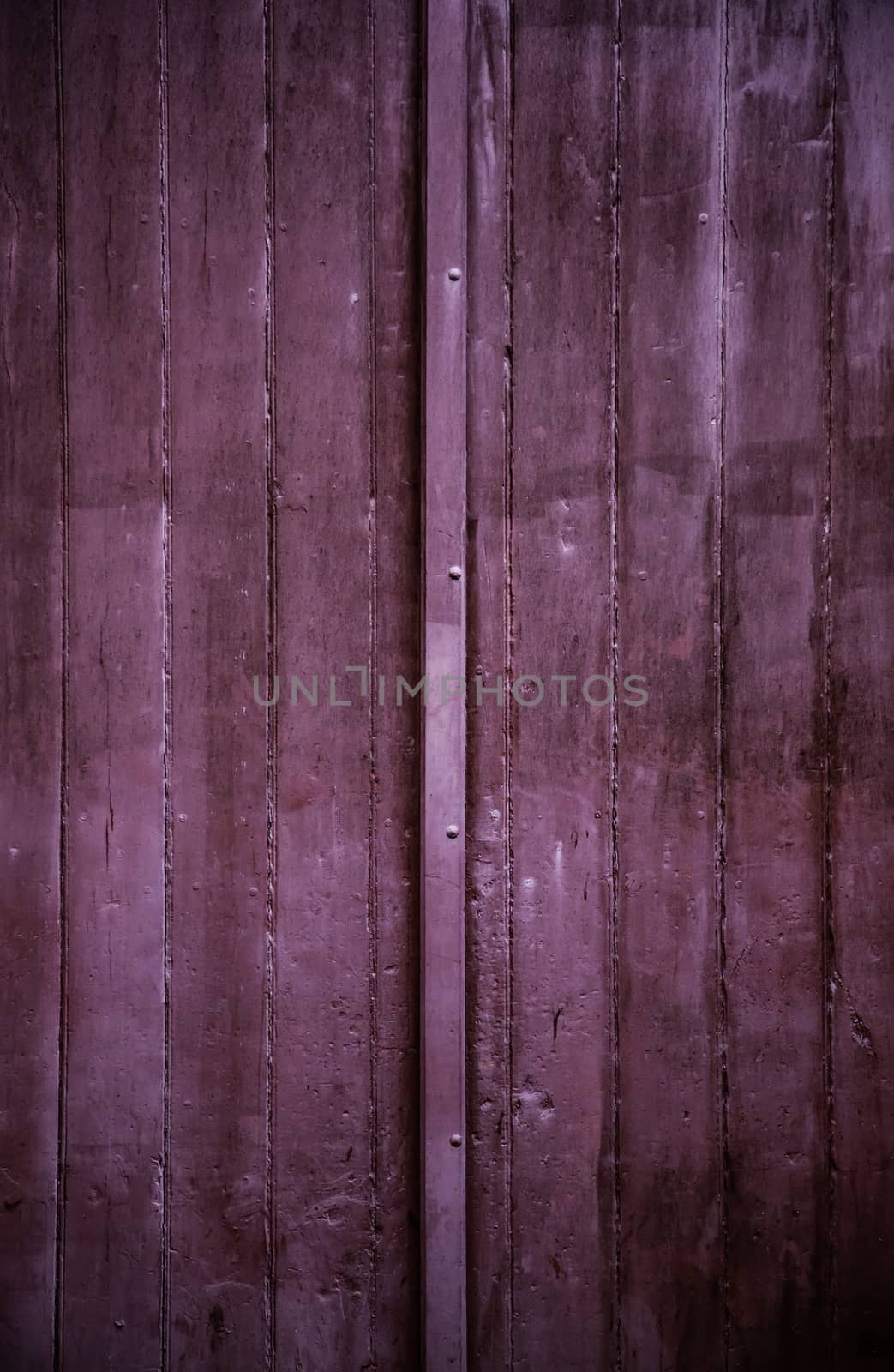 Old wooden door with metal, medieval door detail, decoration and security
