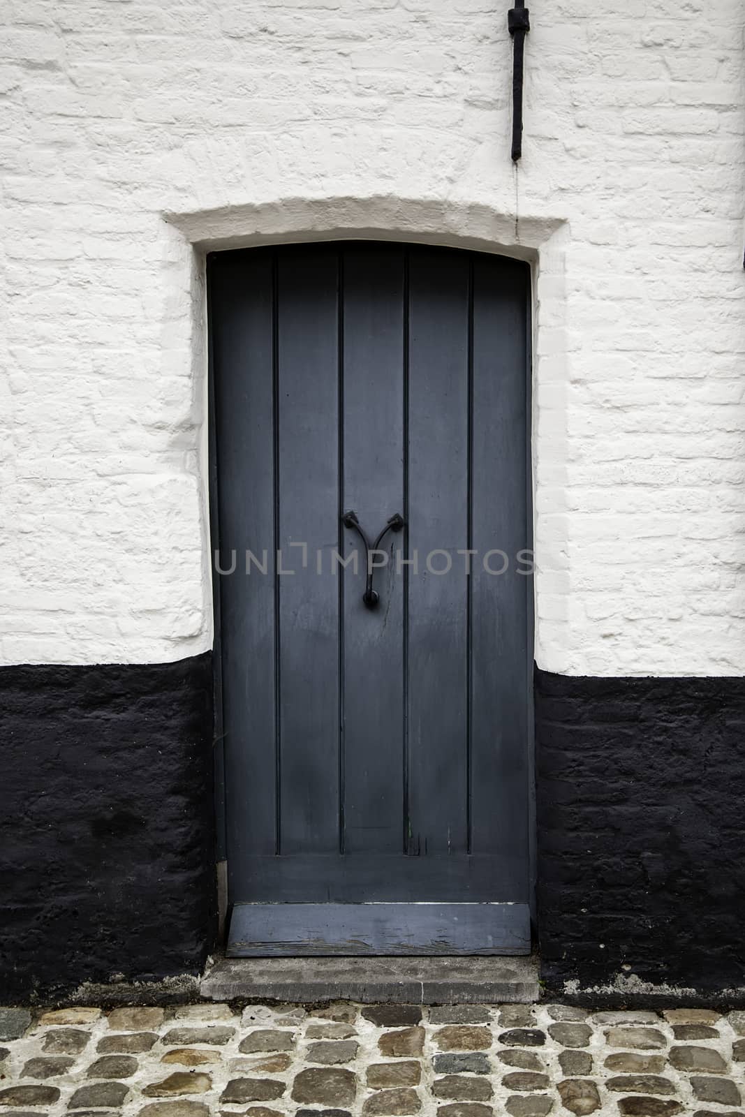 House typical of bruges, detail of medieval houses, tourism in Belgium, Europe
