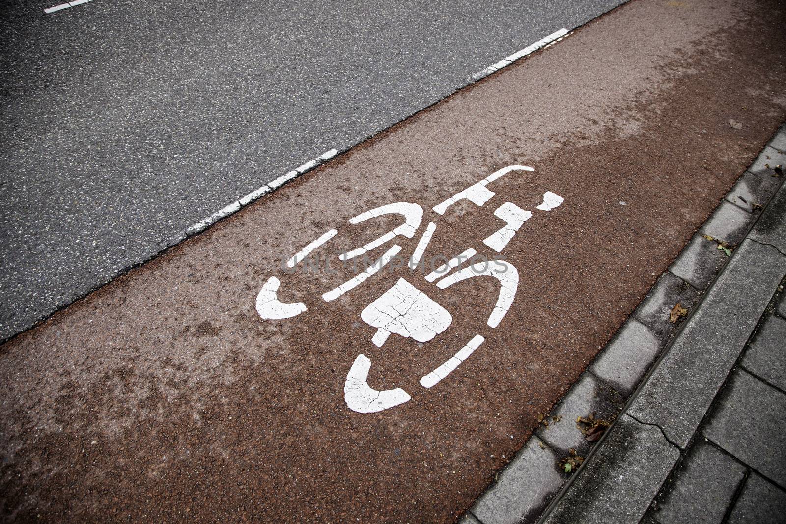 Bicycle sign with arrow, detail of information, transport