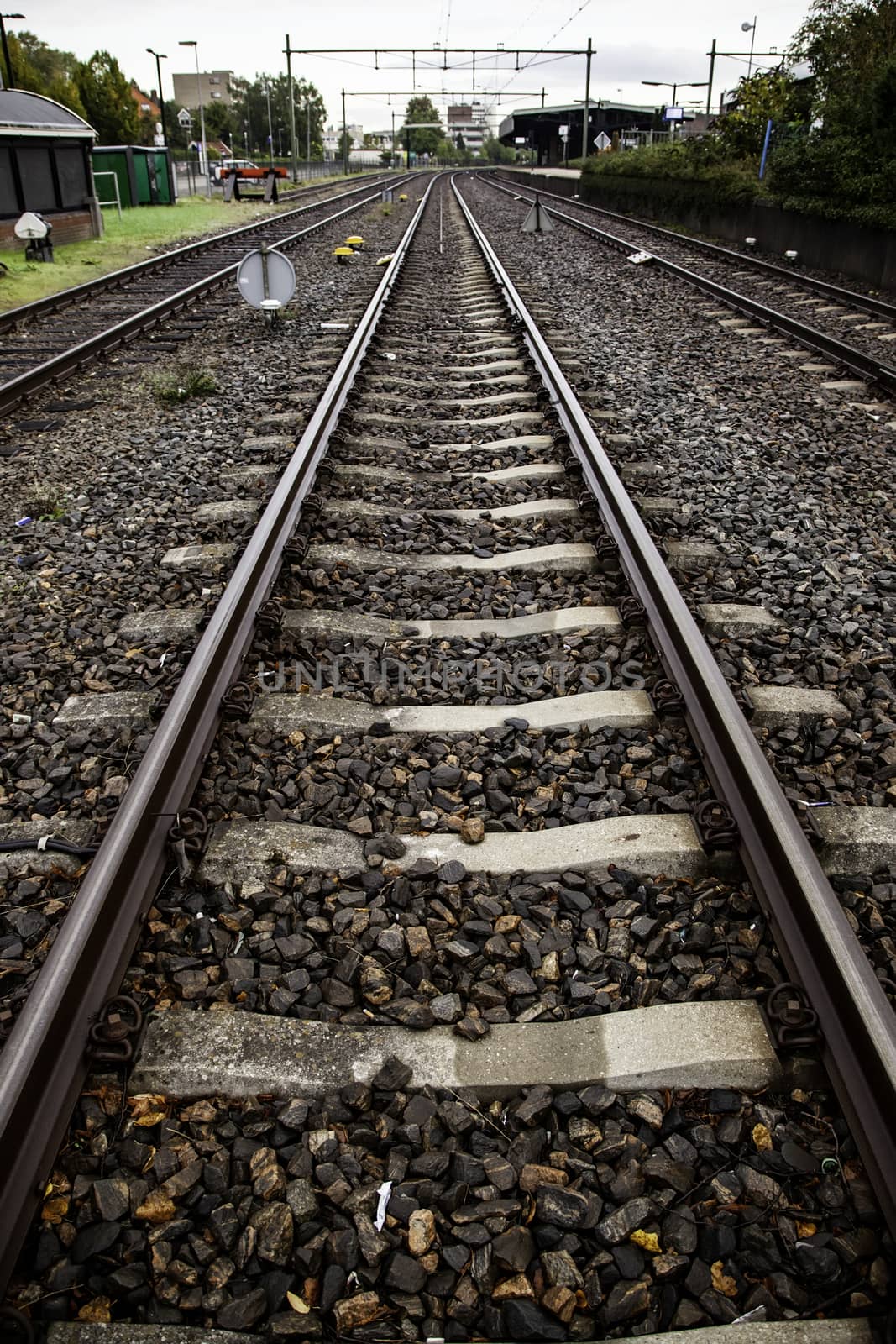 Train tracks in a station, transport detail by rails, trip