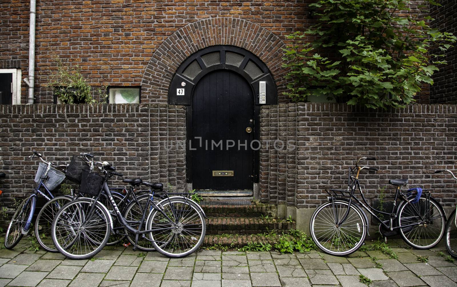 Typical bicycle in Bruges, detail of transport in town, tourism and exploration of the city