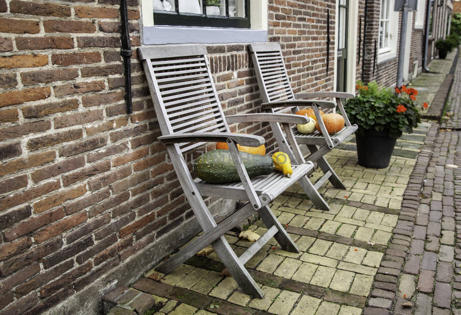 Pumpkins on a chair, Halloween decoration detail