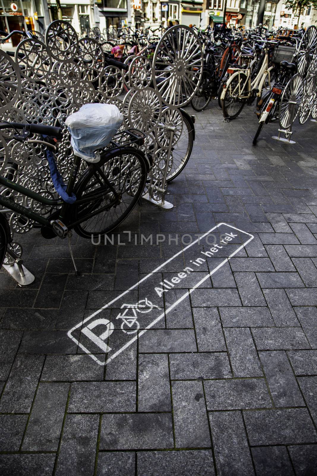 Bicycle parking in Amsterdam by esebene