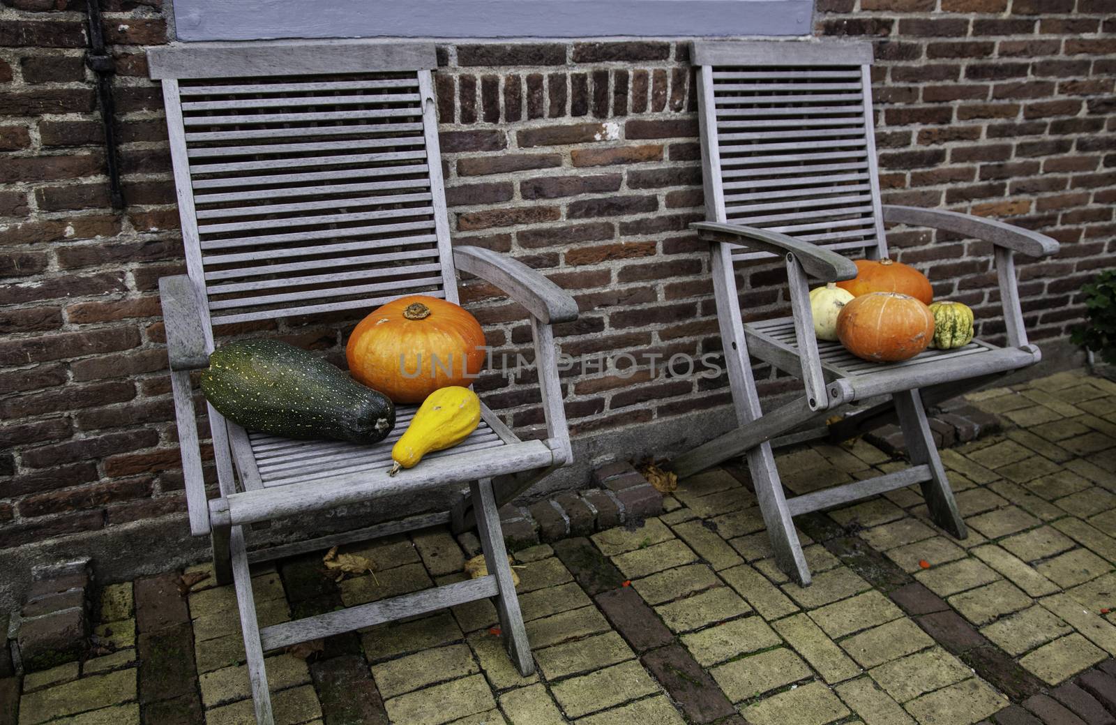 Pumpkins on a chair, Halloween decoration detail
