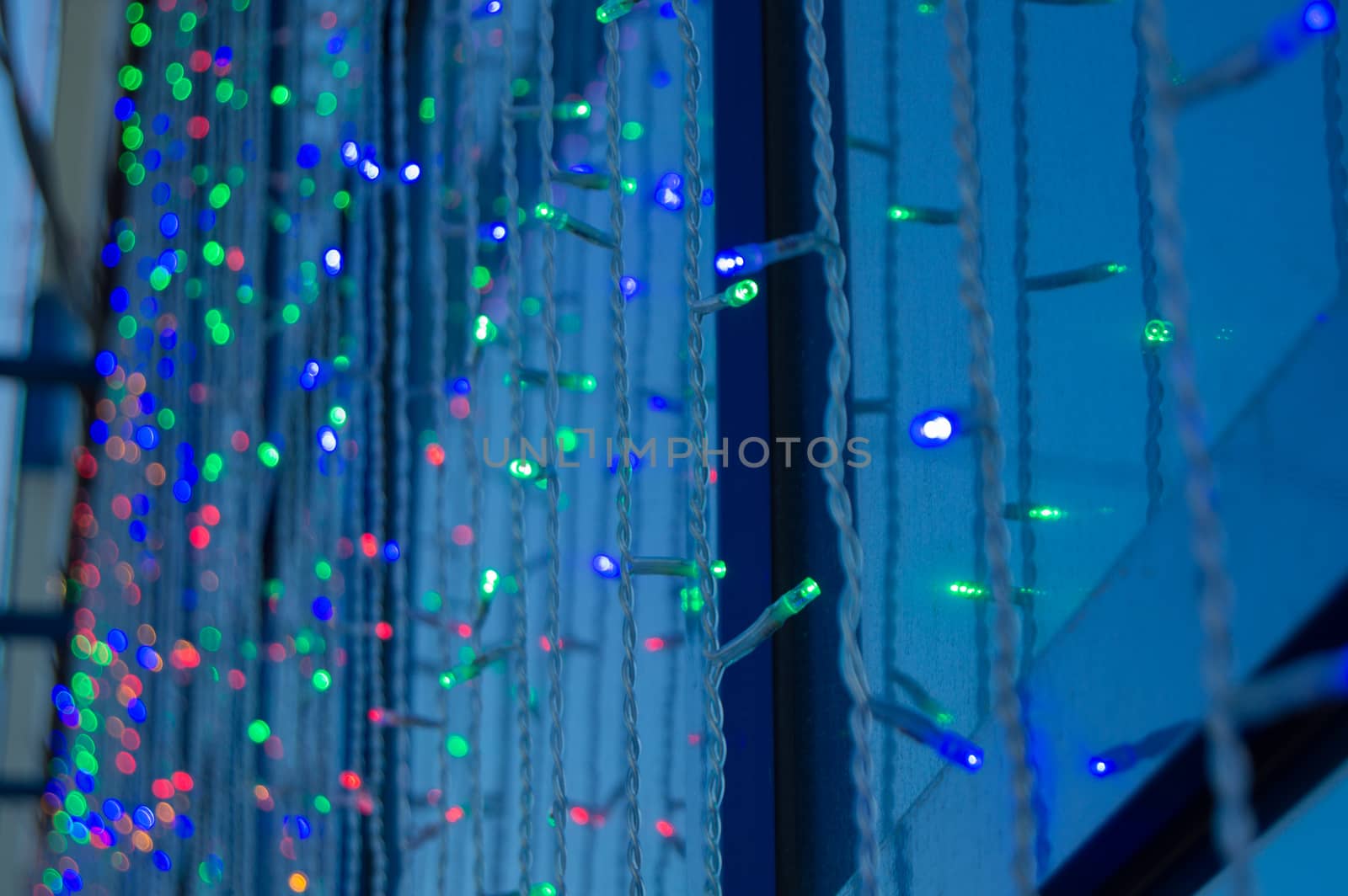 Festive decoration of office buildings, lights electric garland with lights.