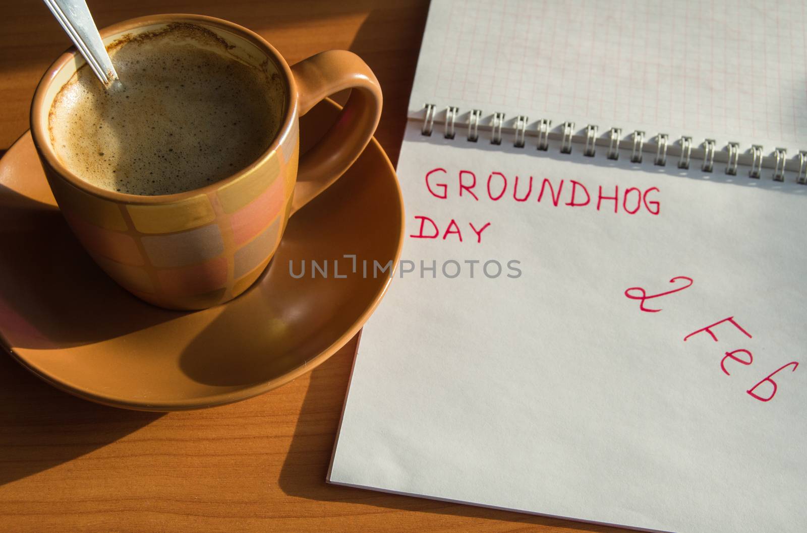Groundhog day February Notepad with the date of 2 Feb and Cup of espresso.