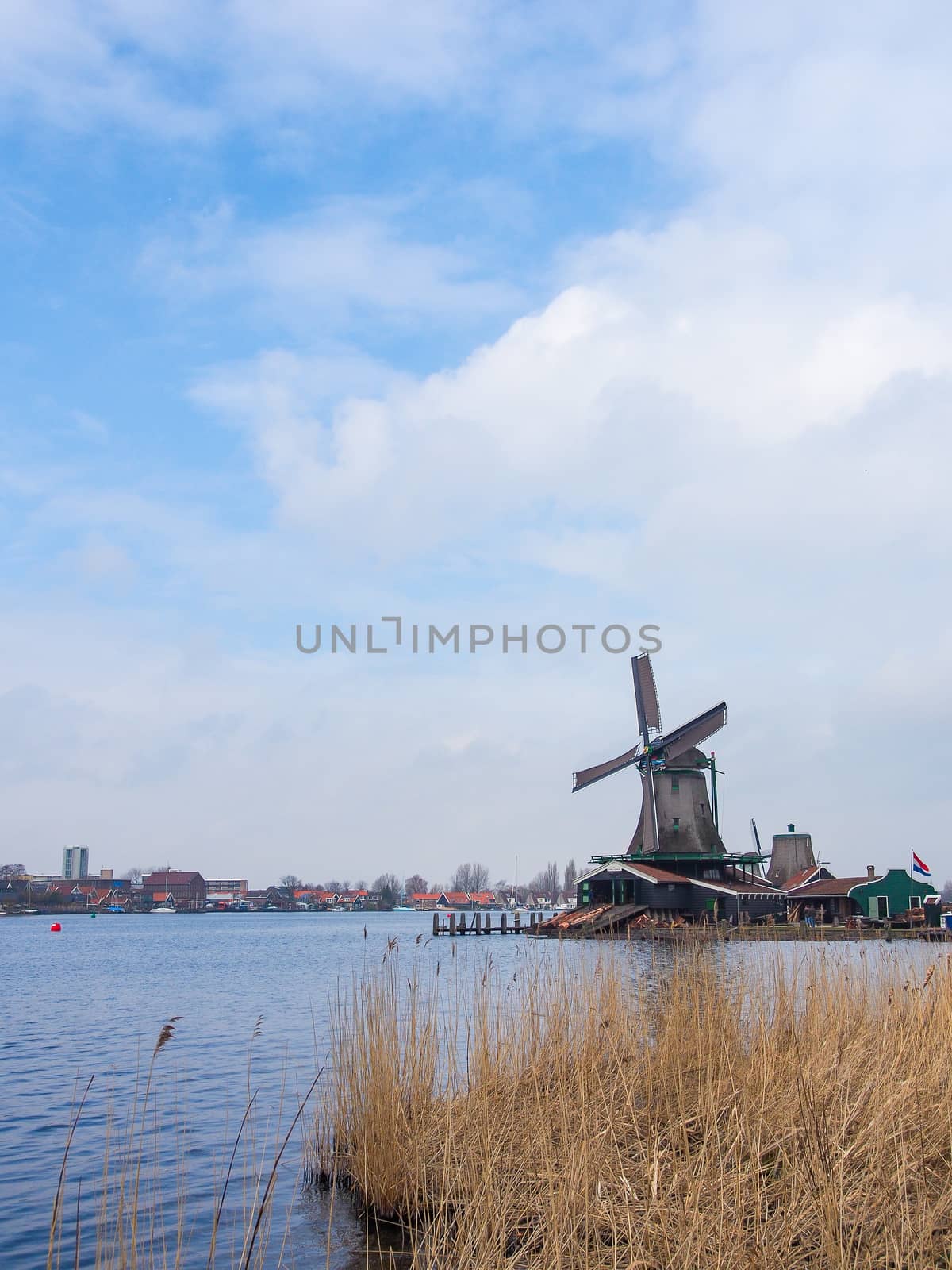 Historic windmills at Zaanse Schans ,neighborhood in the Dutch town of Zaandam, near Amsterdam,  The Netherlands.