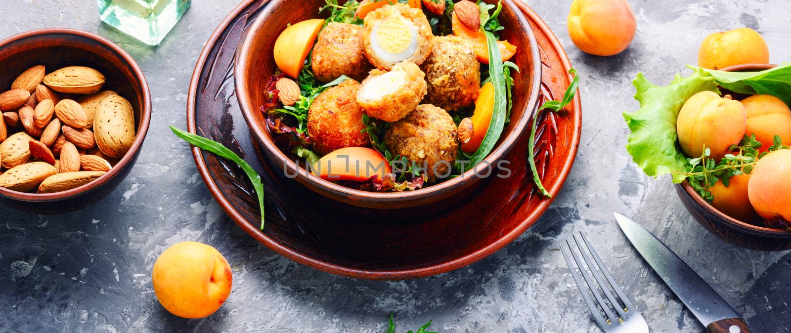 Summer salad with apricot, egg and greens