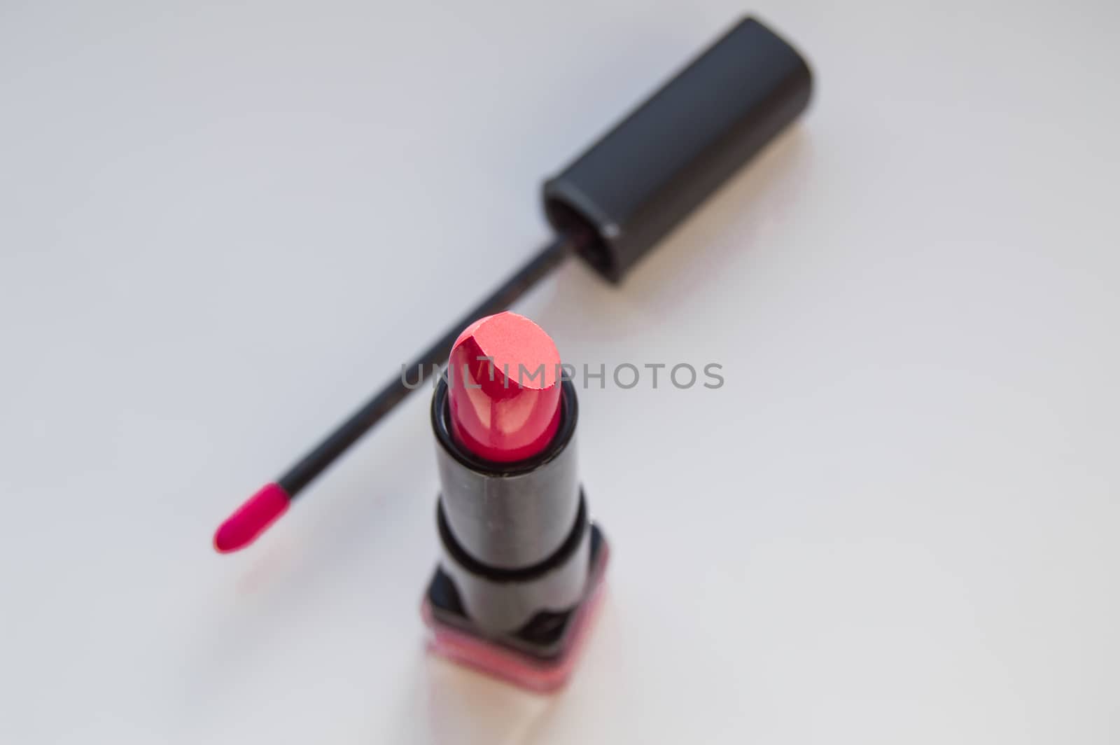 brush for lipgloss, lipstick red, pink on white background by claire_lucia