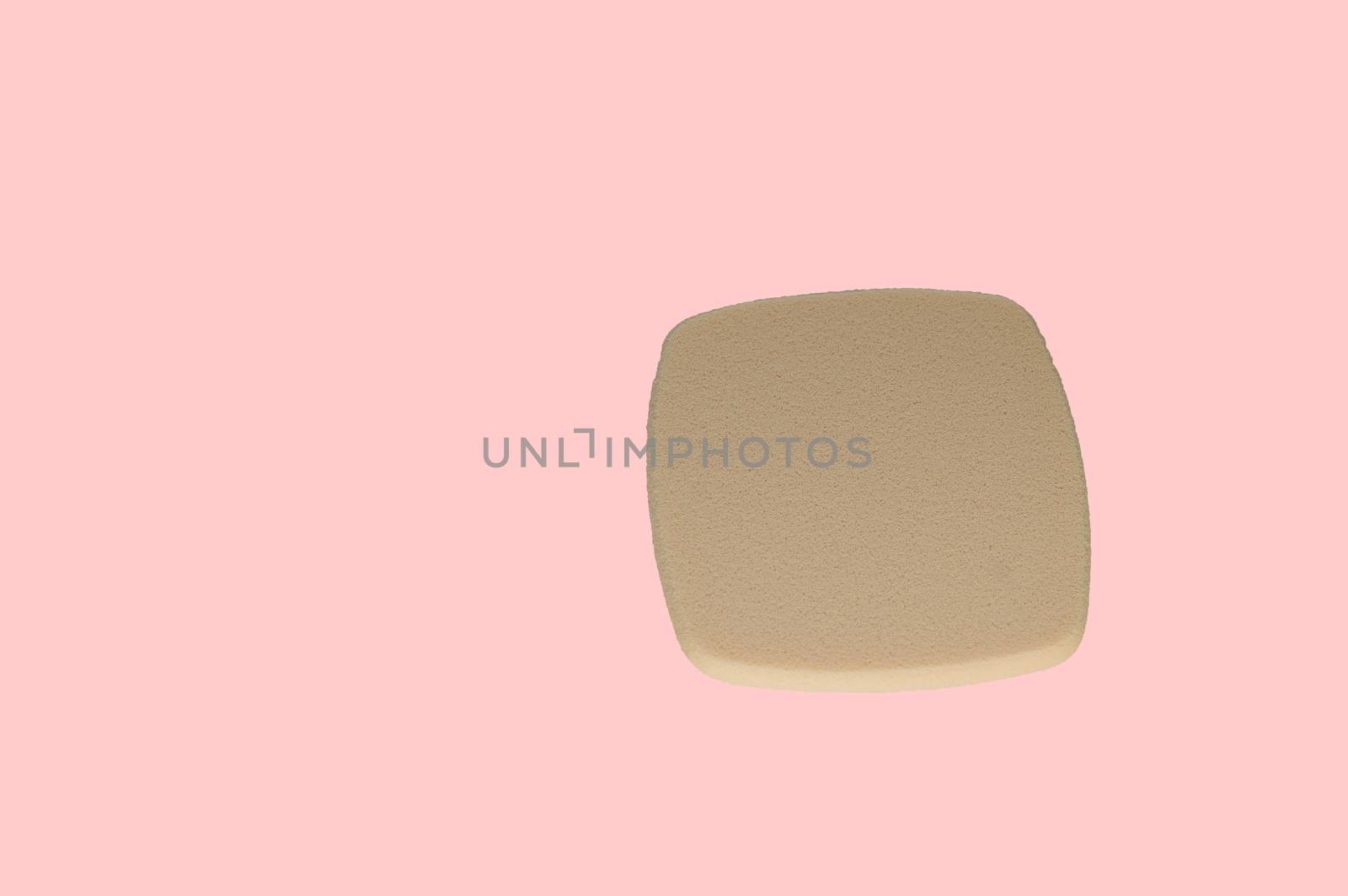 Cosmetic puff for makeup isolated on pink background, top view by claire_lucia