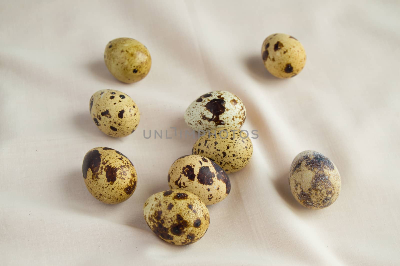 Quail eggs are on the table, the Concept of Easter and a healthy diet.