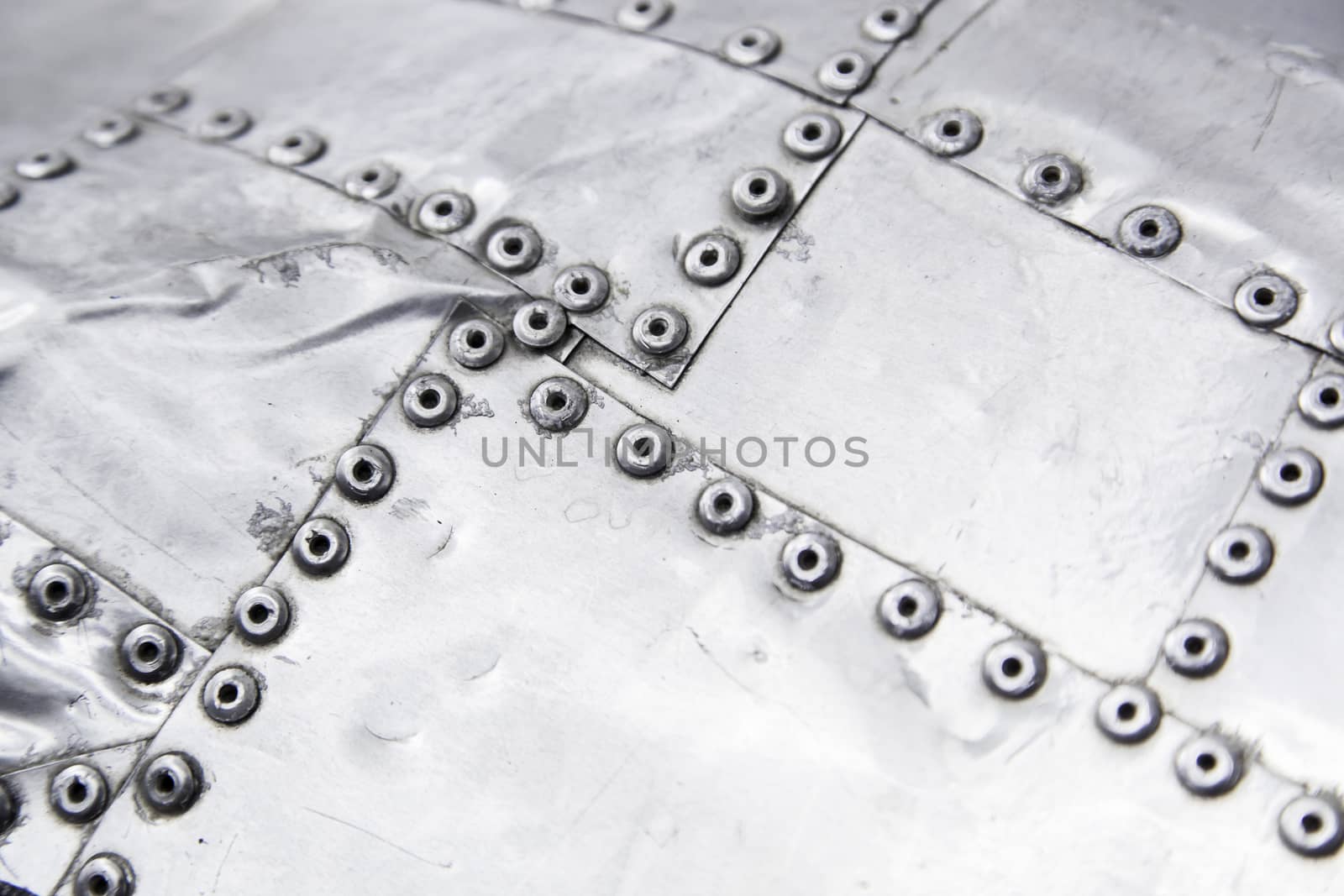 Metal background with rivets by esebene