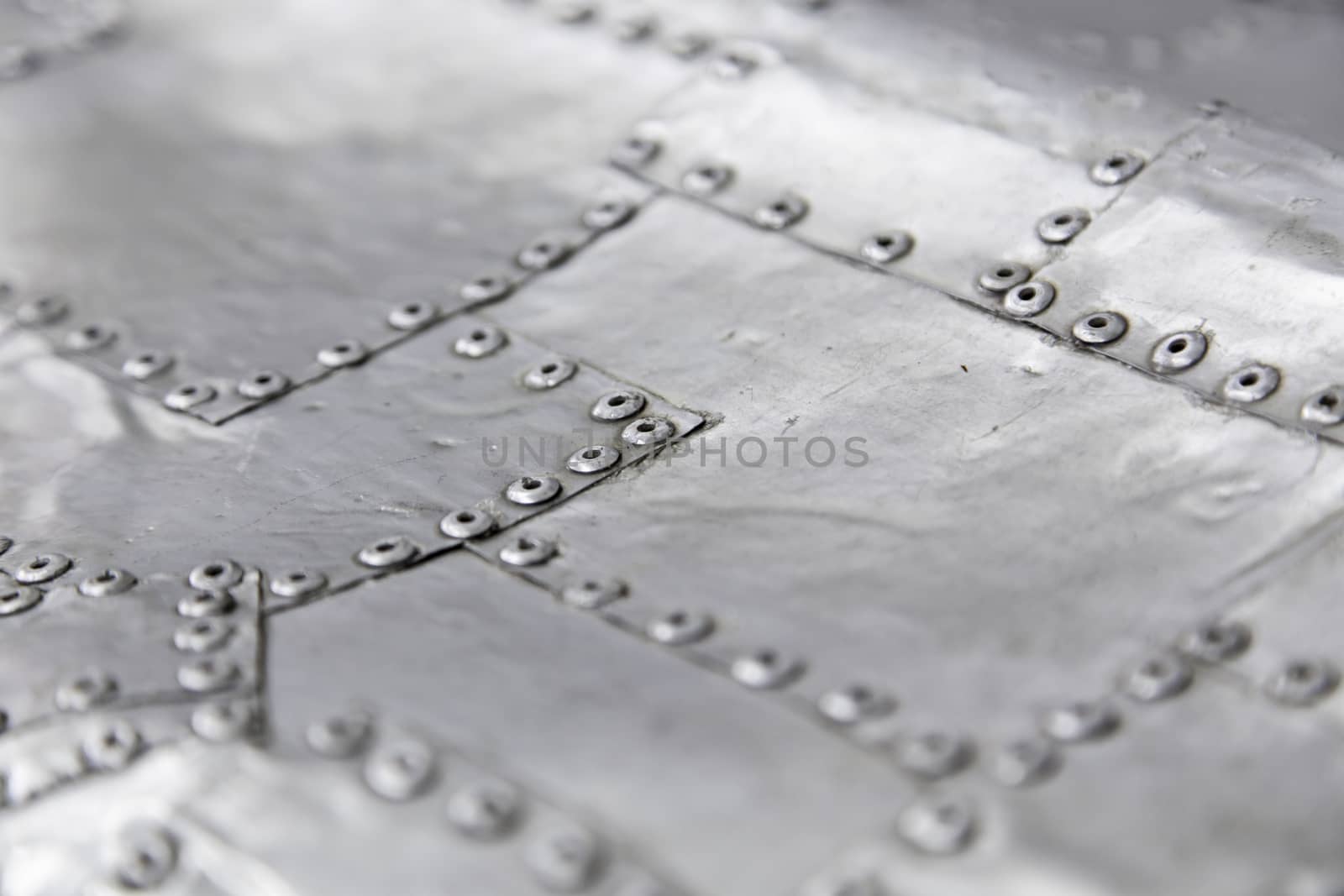 Metal background with rivets by esebene