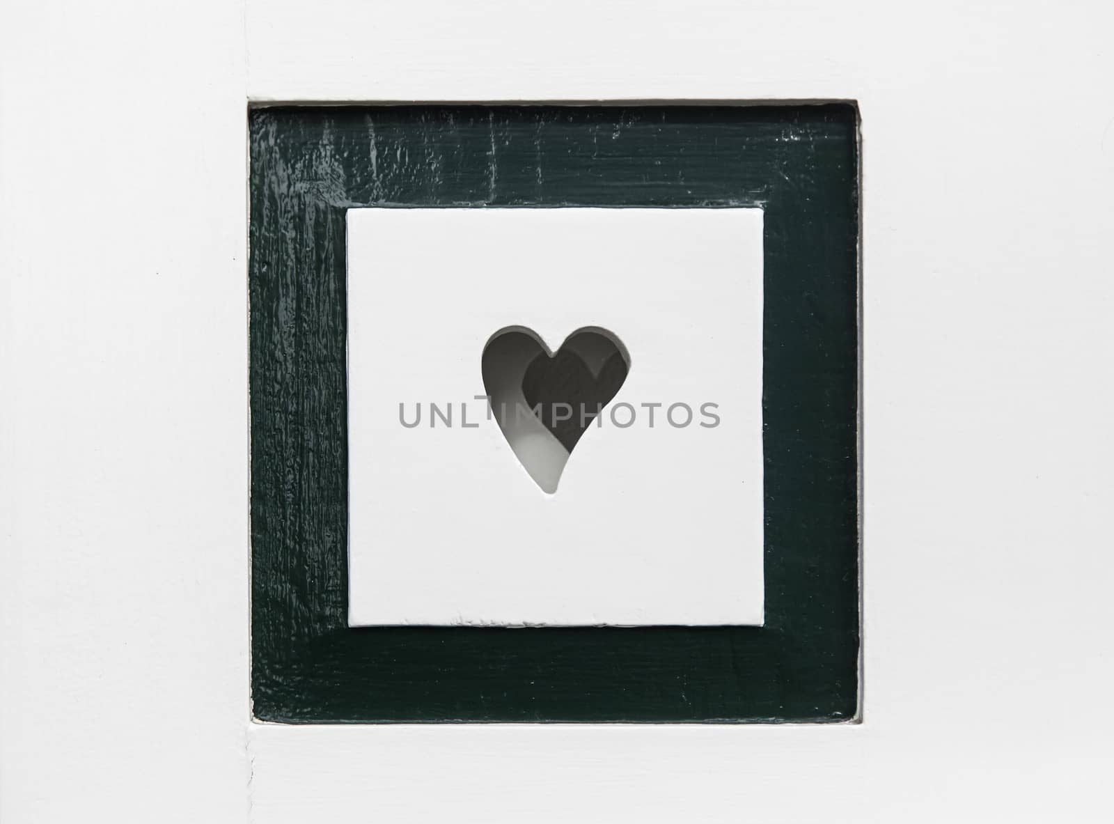 Heart in a wood, detail of a romantic symbol, love