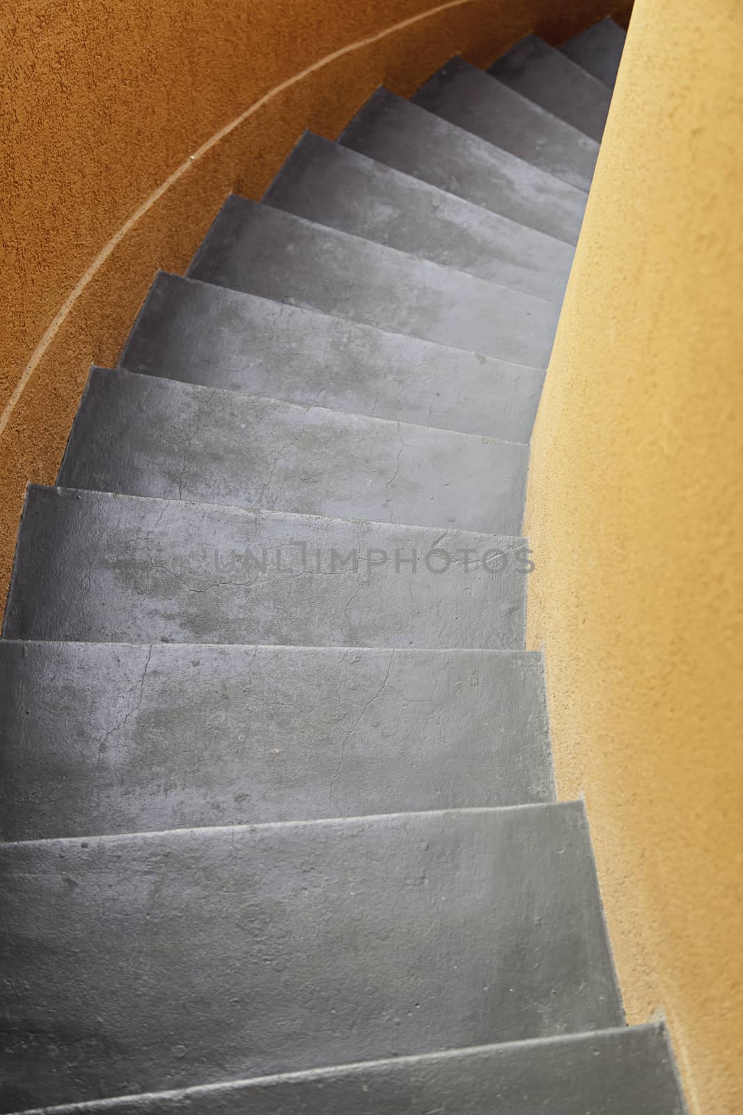 Black stone staircase, detail of a staircase, pedestrians