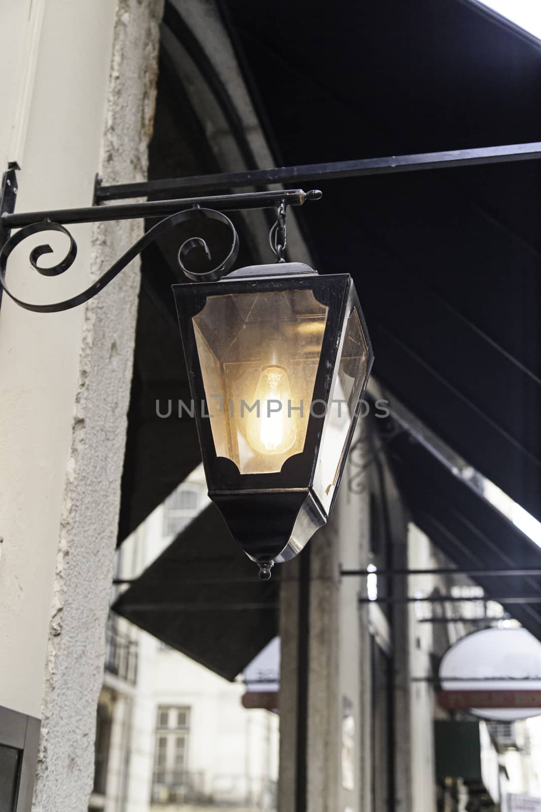 Lantern lit inside of station, lighting