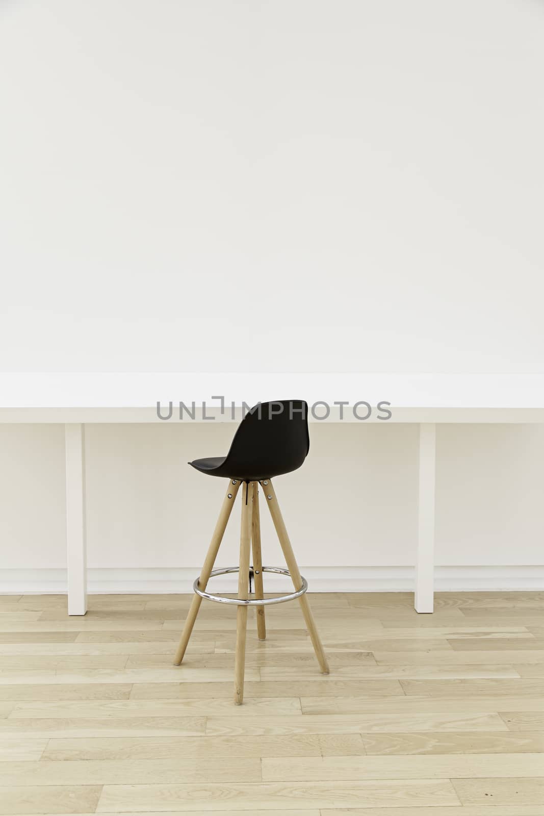 Black office chair, detail of office furniture, rest and relaxation