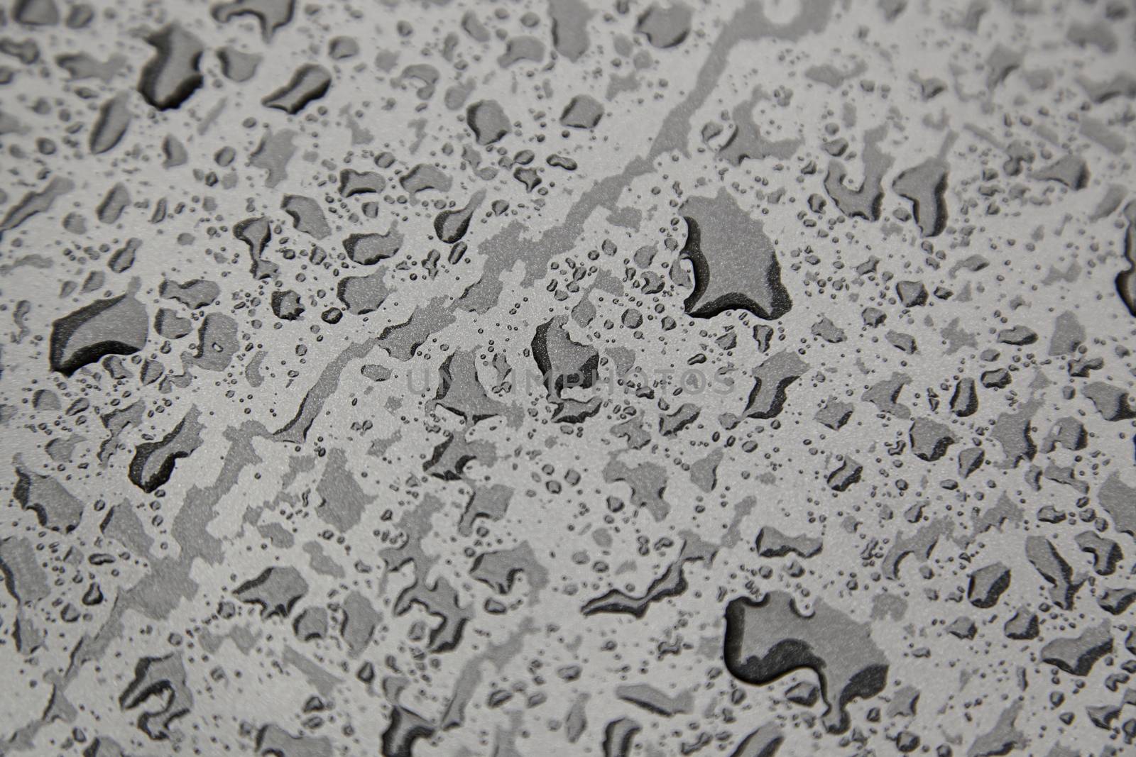 Wet metal, detail of raindrops, rain