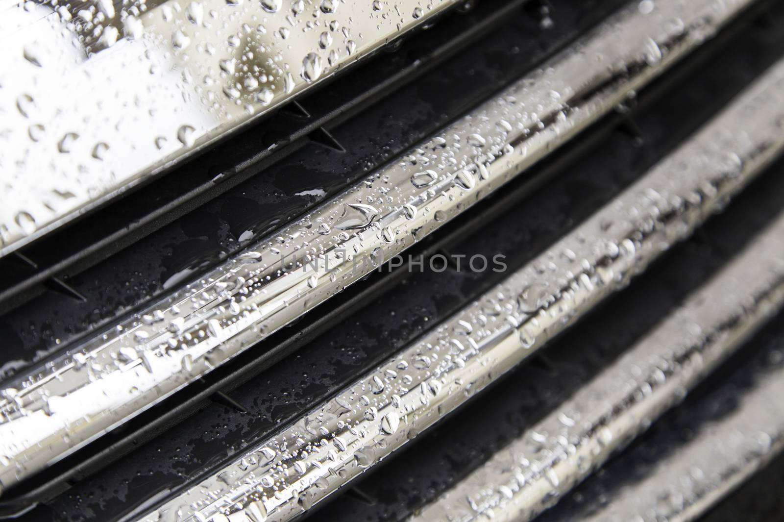 Wet metal, detail of raindrops, rain