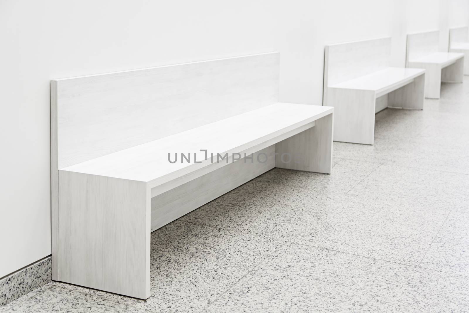 White decorative benches, detail of furniture to rest