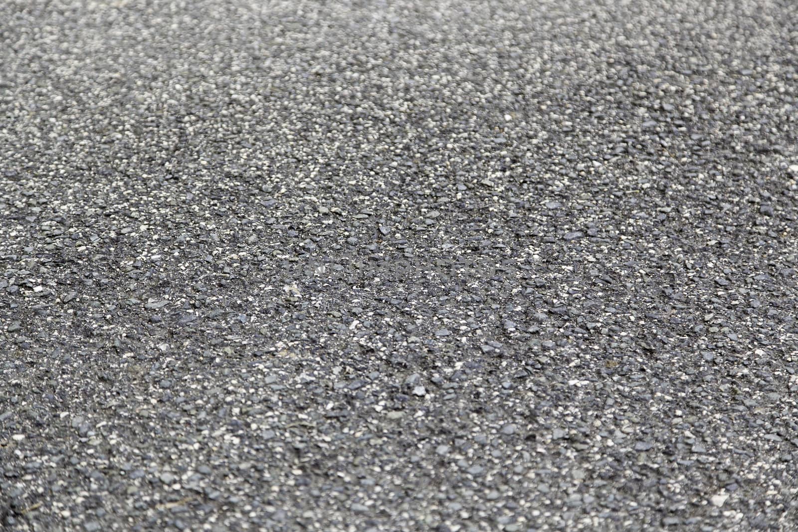 Asphalt background, detail of a textured background, road