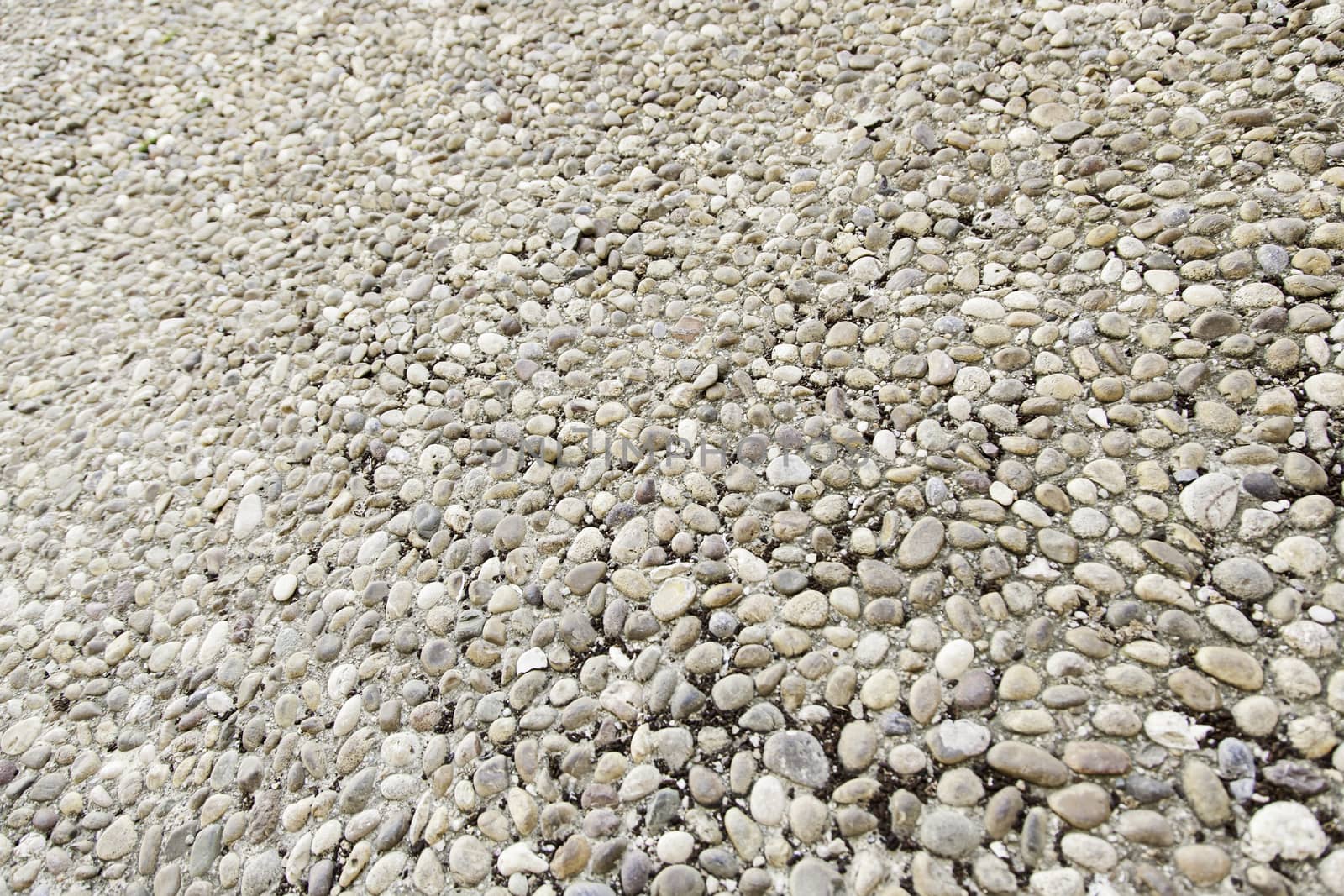 Medieval stone floor, detail of an old floor, pedestrian pavement