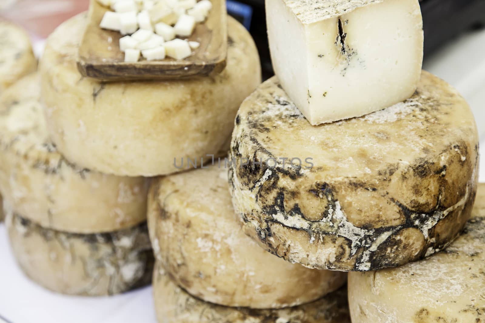Artisan cheese in a market, detail of food, food and tradition, dairy product