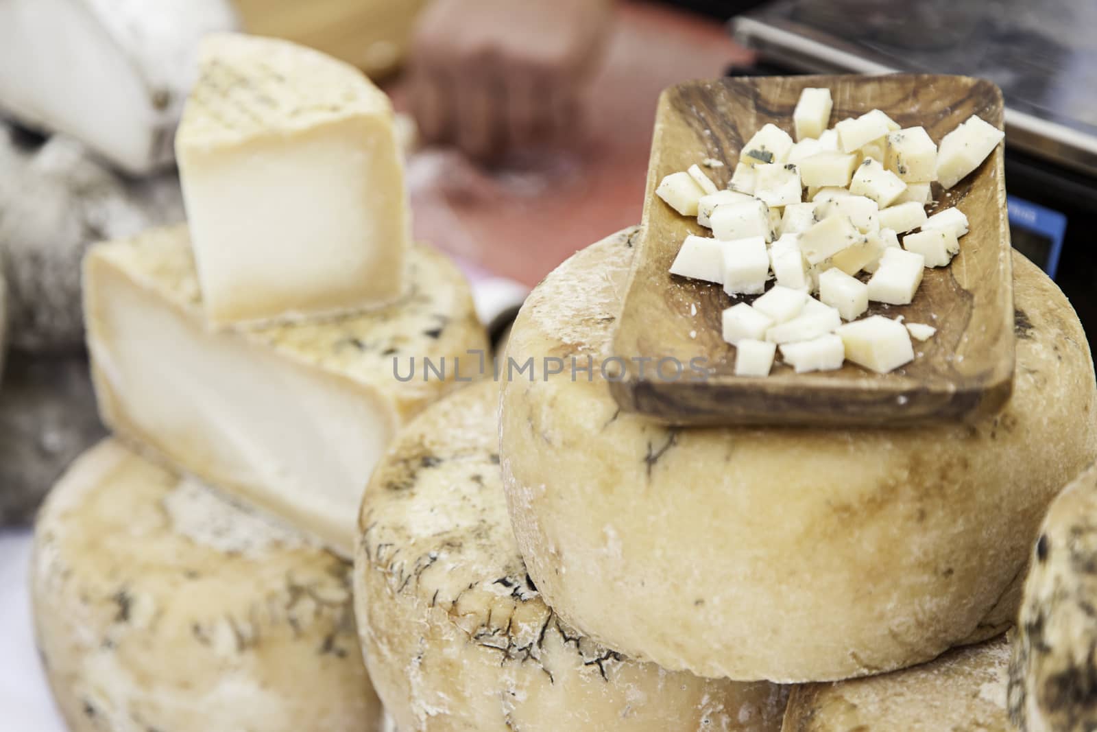 Artisan cheese in a market, detail of food, food and tradition, dairy product