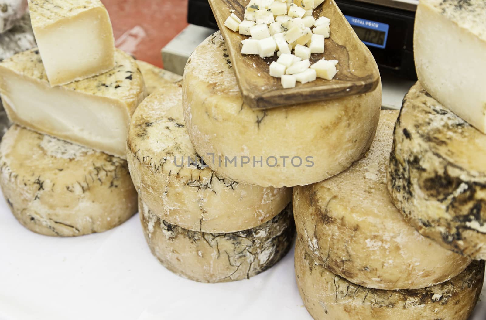 Artisan cheese in a market, detail of food, food and tradition, dairy product
